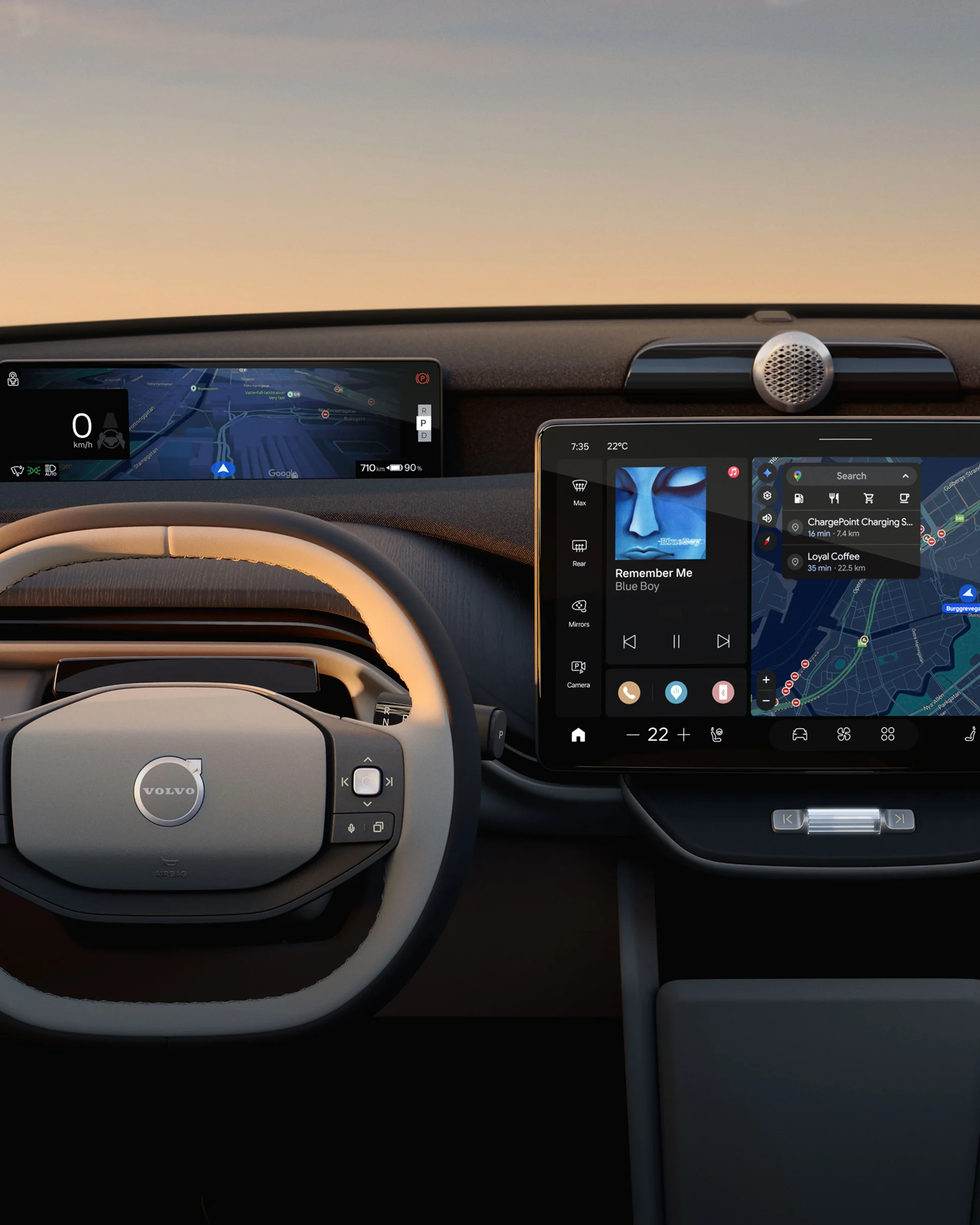 Приборная панель Volvo EX60 с рулевым колесом, дисплеем водителя и центральным дисплеем.