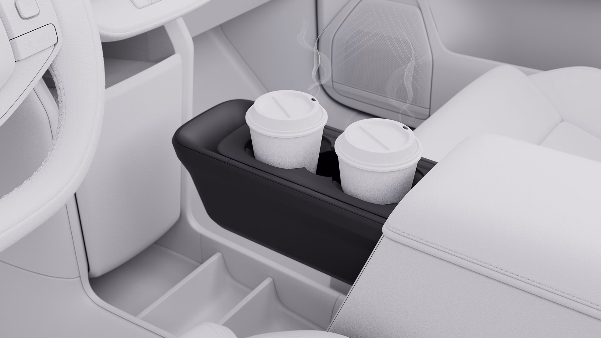 Два стакана с крышками в подстаканниках на центральной консоли автомобиля Volvo.