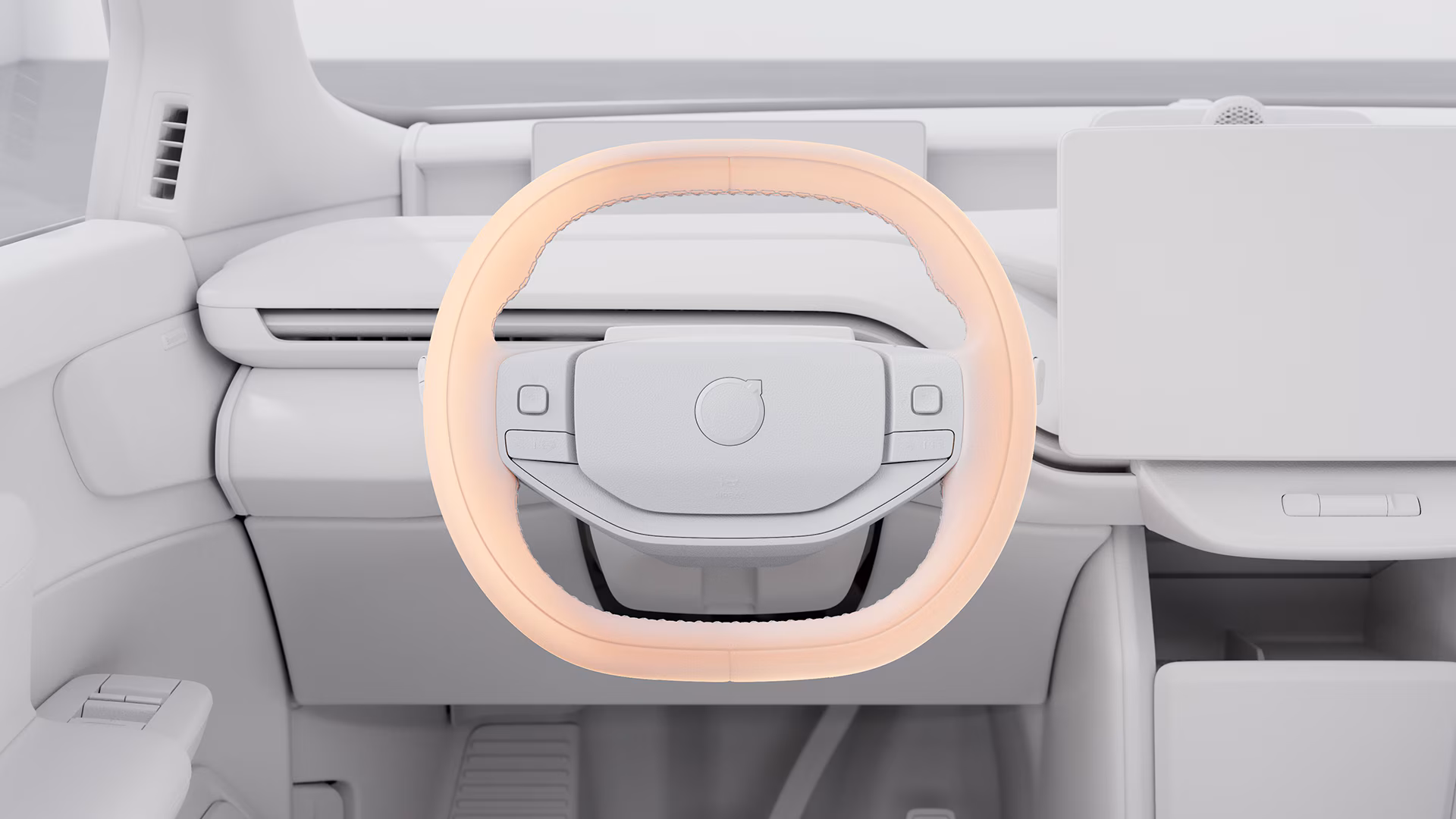 Крупный план рулевого колеса автомобиля Volvo со светлым акцентом, демонстрирующий минималистичный дизайн приборной панели.