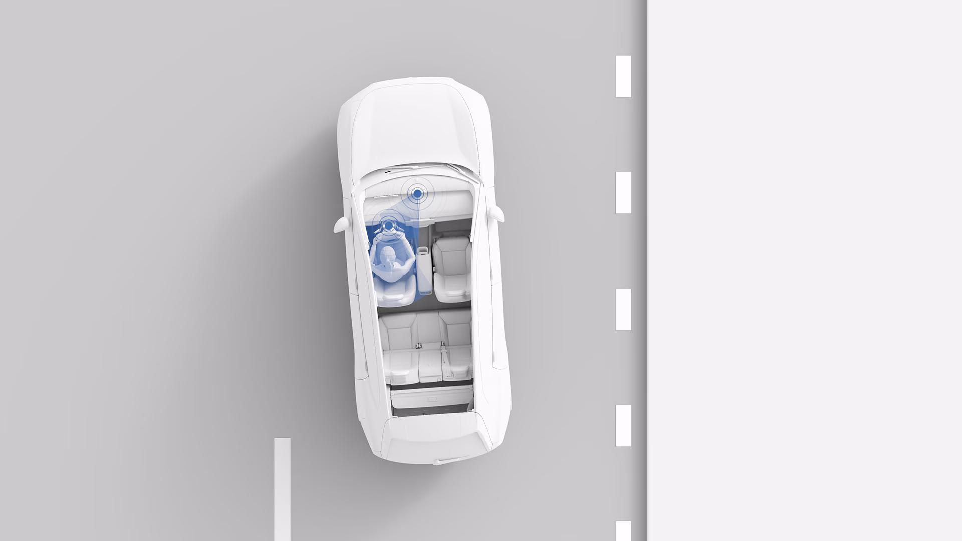 Вид сверху на иллюстрацию автомобиля Volvo, демонстрирующую систему мониторинга внимания водителя с выделением зоны фокусировки водителя и датчика.