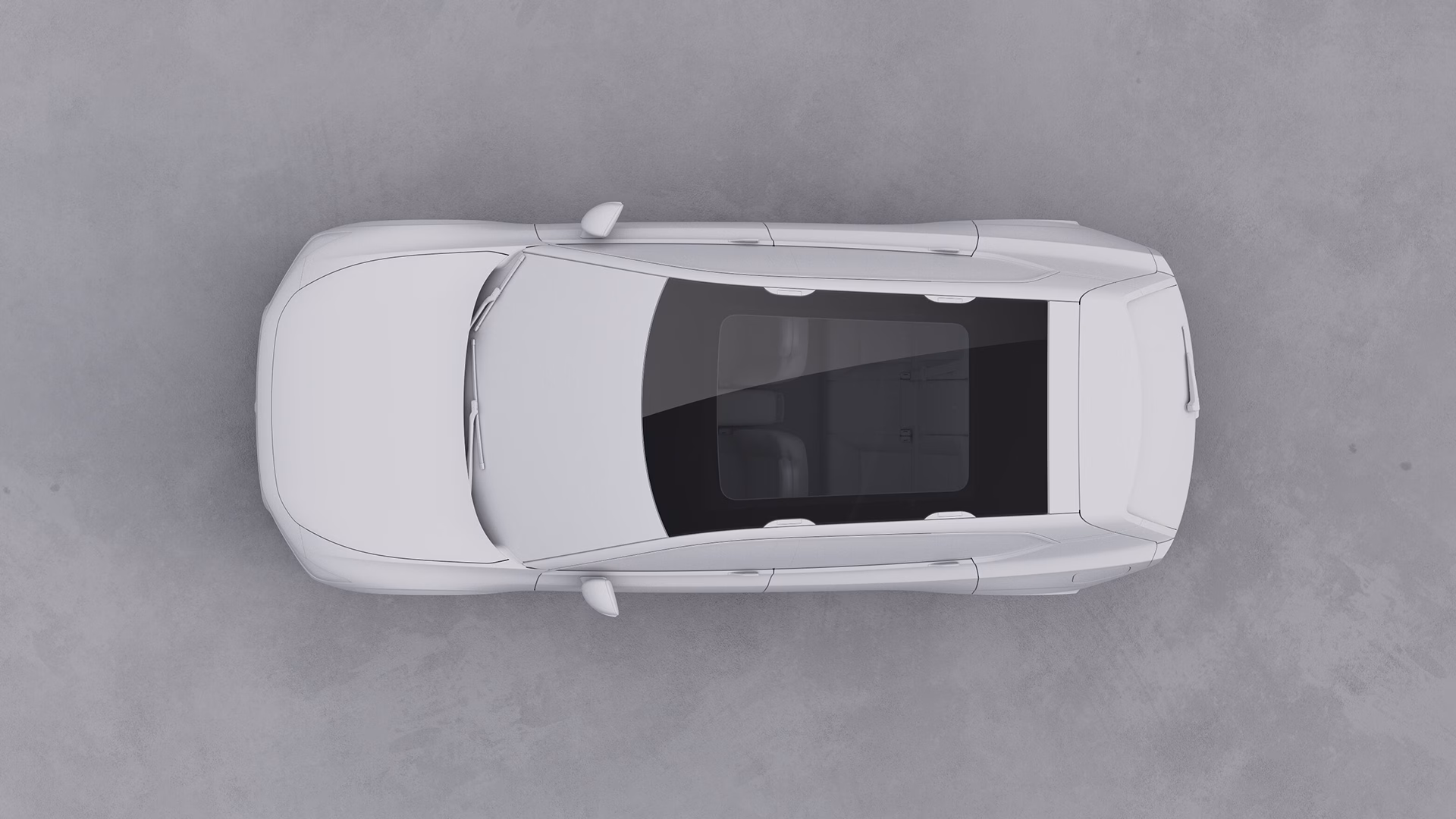 Вид сверху на автомобиль Volvo с панорамной стеклянной крышей.