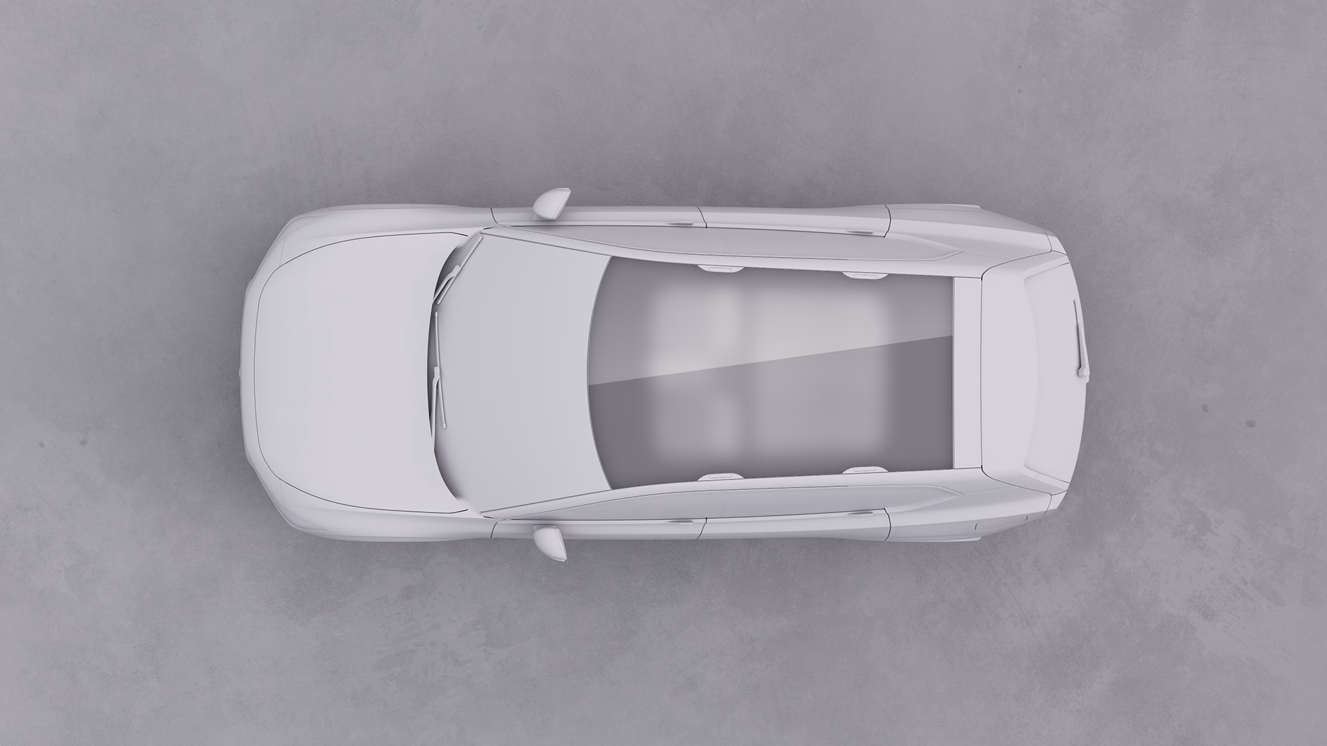 Вид сверху на автомобиль Volvo с панорамной стеклянной крышей.