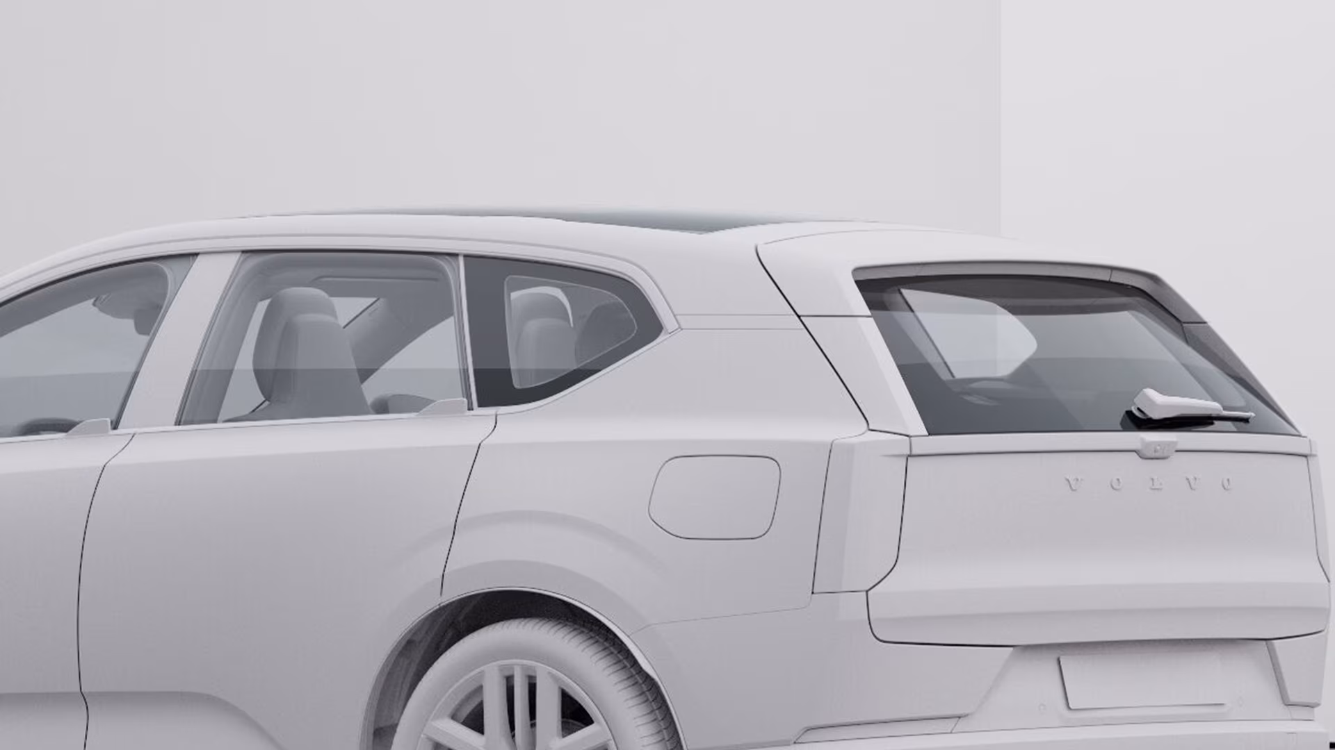 Вид сзади и сбоку на внедорожник Volvo в монохромной незакрашенной дизайн-студии.