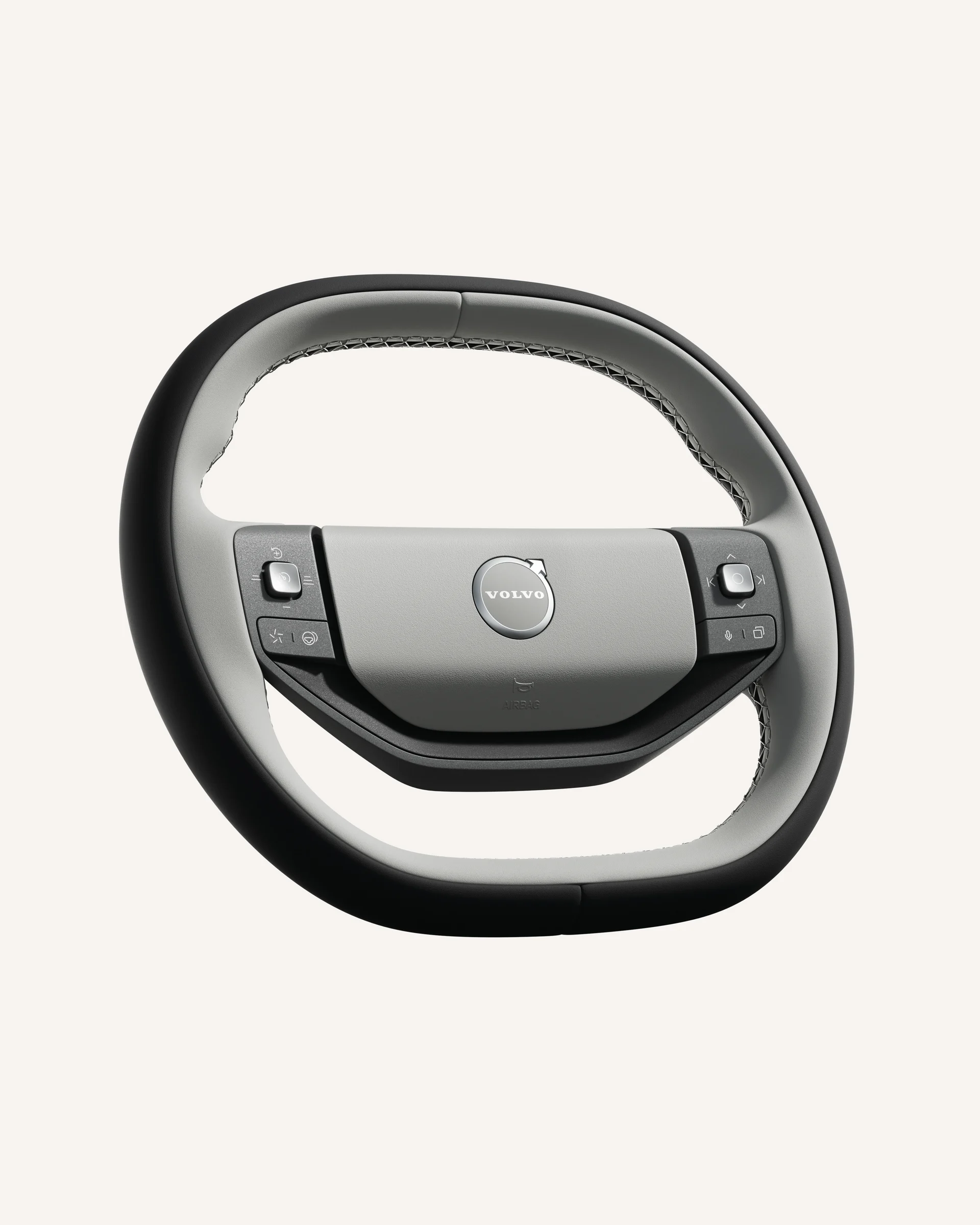 Крупный план полностью электрического рулевого колеса Volvo EX60 со встроенными органами управления.