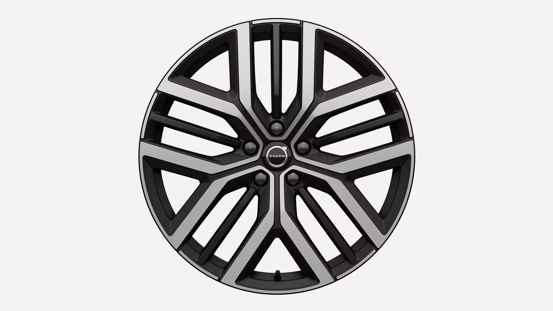 Легкосплавные колесные диски Volvo с современным дизайном с несколькими спицами и логотипом Volvo в центре.