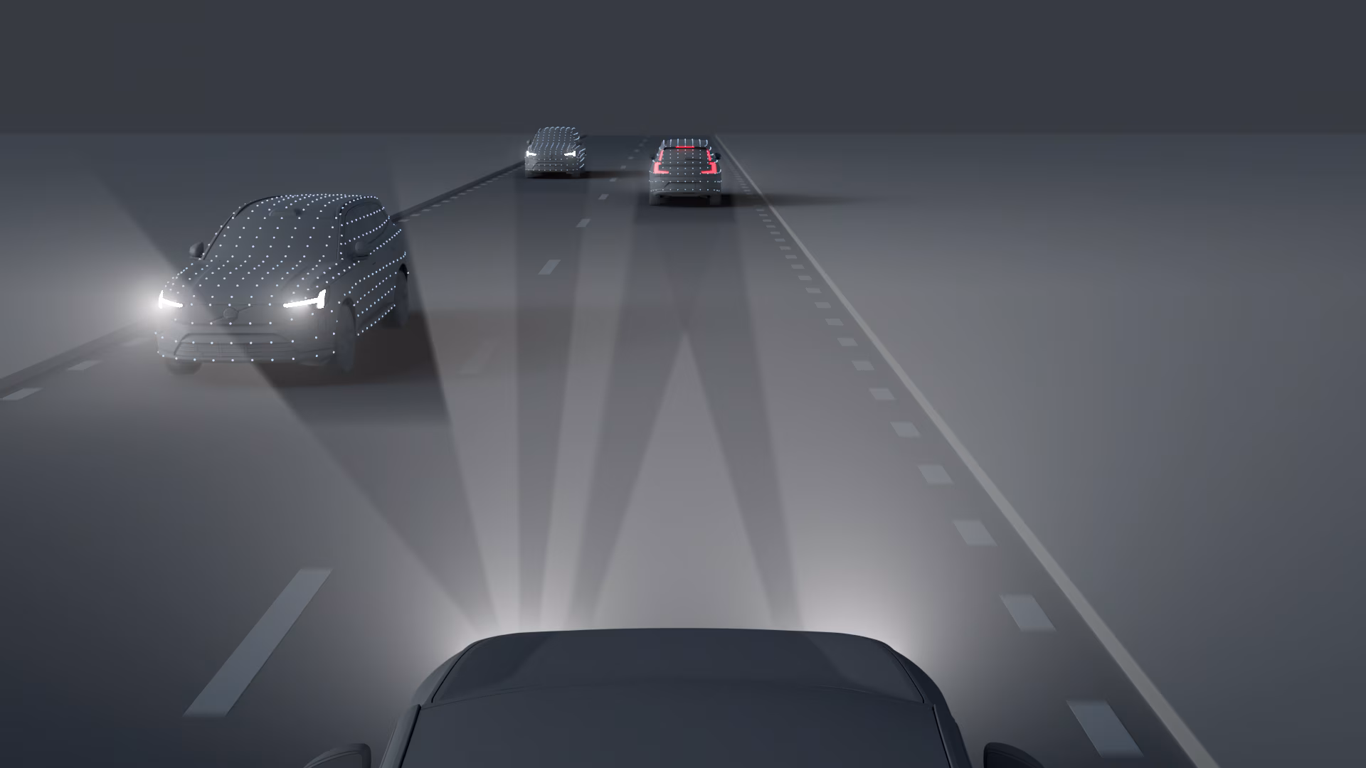 Иллюстрация автомобилей Volvo, движущихся ночью с подсвеченными лучами фар, демонстрирующая передовые технологии освещения или безопасности.