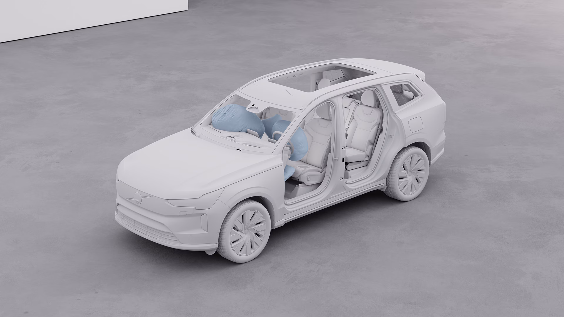 3D-модель внедорожника Volvo с открытыми дверями, демонстрирующая сработавшие подушки безопасности на передних сиденьях для иллюстрации функций безопасности.