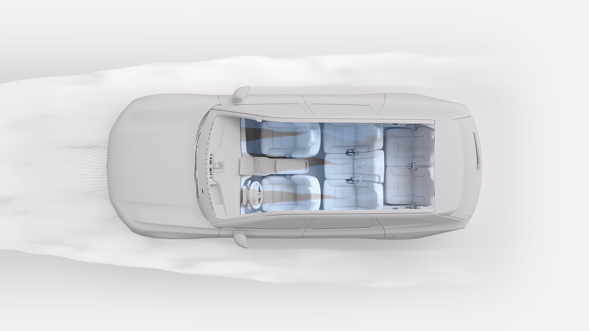 Вид сверху на изображение внедорожника Volvo, подчеркивающий его просторные сиденья и схему воздушного потока.