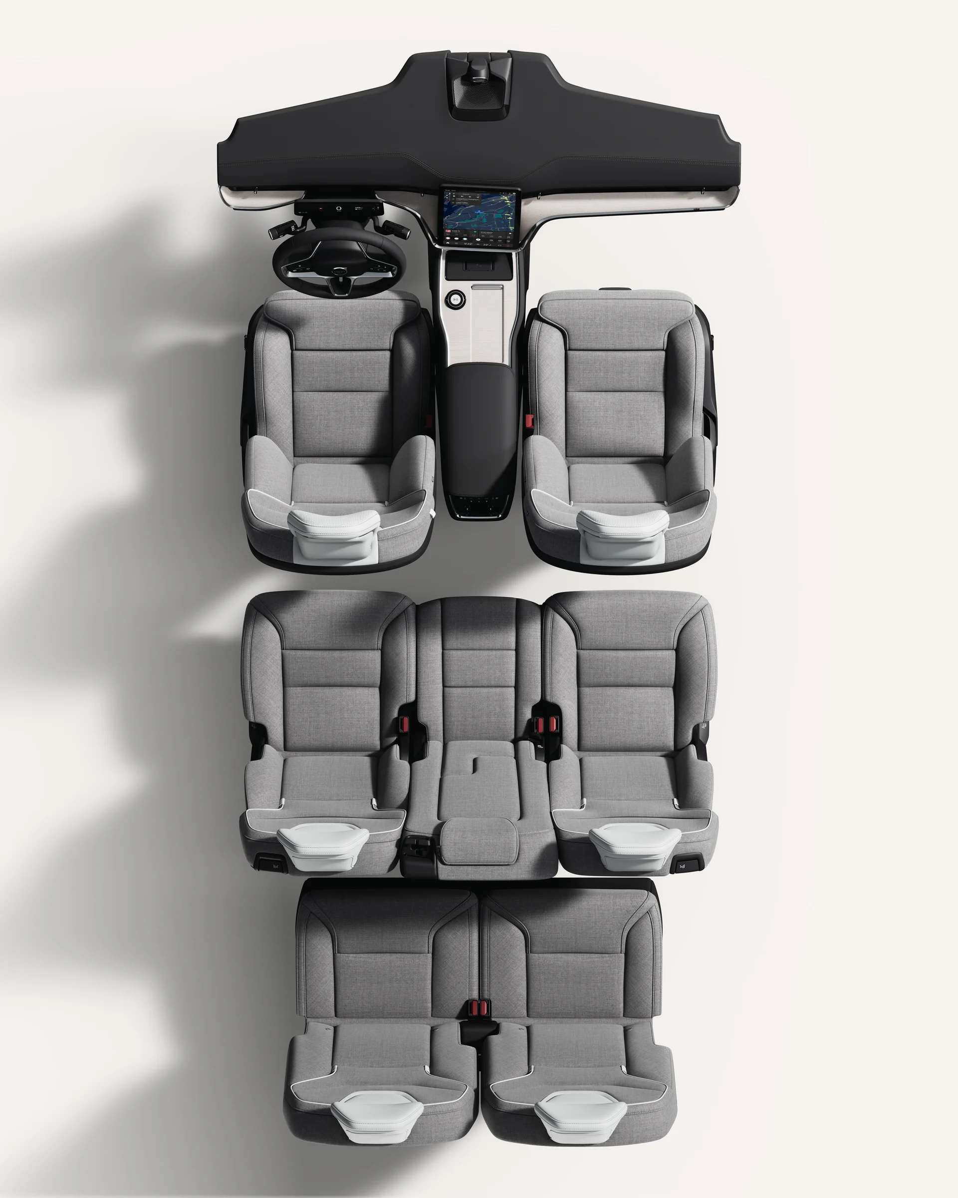 Вид сверху вниз на салон Volvo EX90 с сиденьями и центральной консолью.