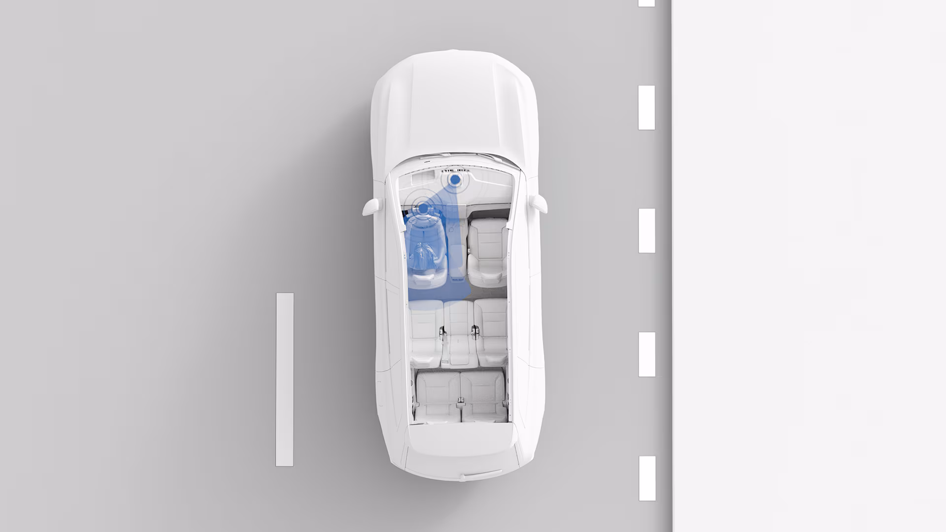 Вид сверху на иллюстрацию автомобиля Volvo, демонстрирующий внутреннюю планировку и выделяющий сиденье водителя синей накладкой, что позволяет акцентировать внимание на функциях помощи водителю или безопасности.