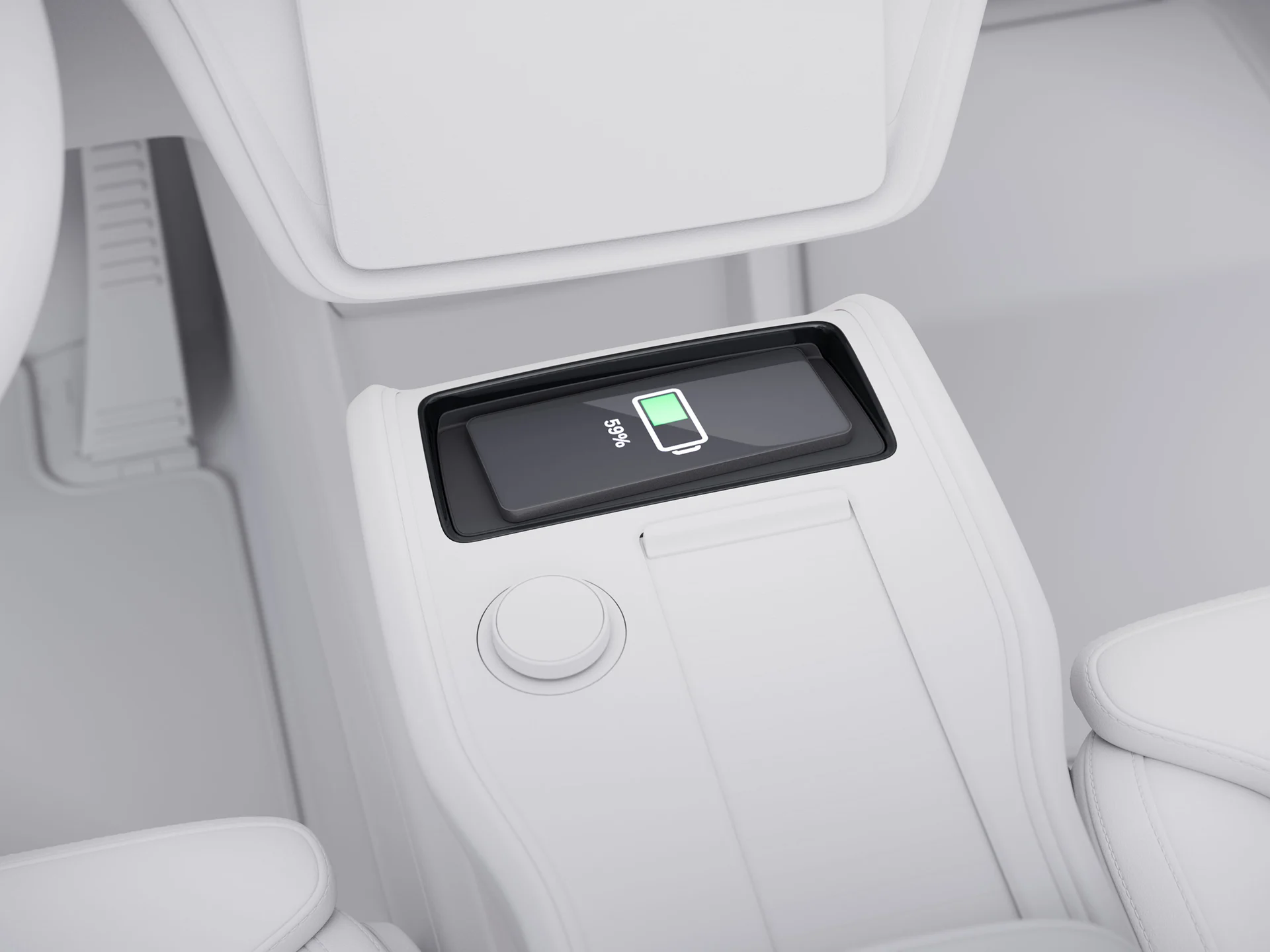 Volvo EX90 оснащен встроенным беспроводным зарядным устройством для телефона.