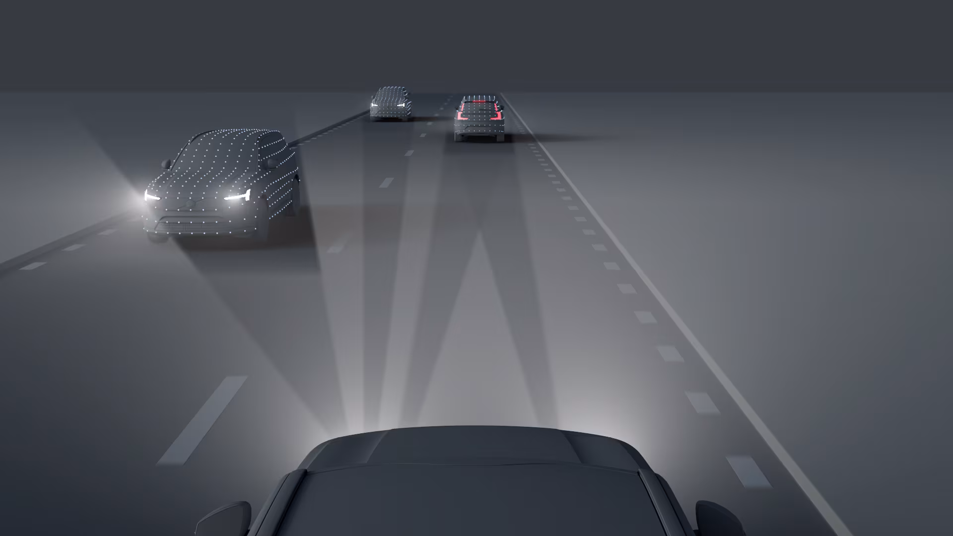 Иллюстрация автомобилей Volvo, движущихся по многополосной дороге в ночное время, с использованием передовых технологий фар для улучшения видимости и безопасности.
