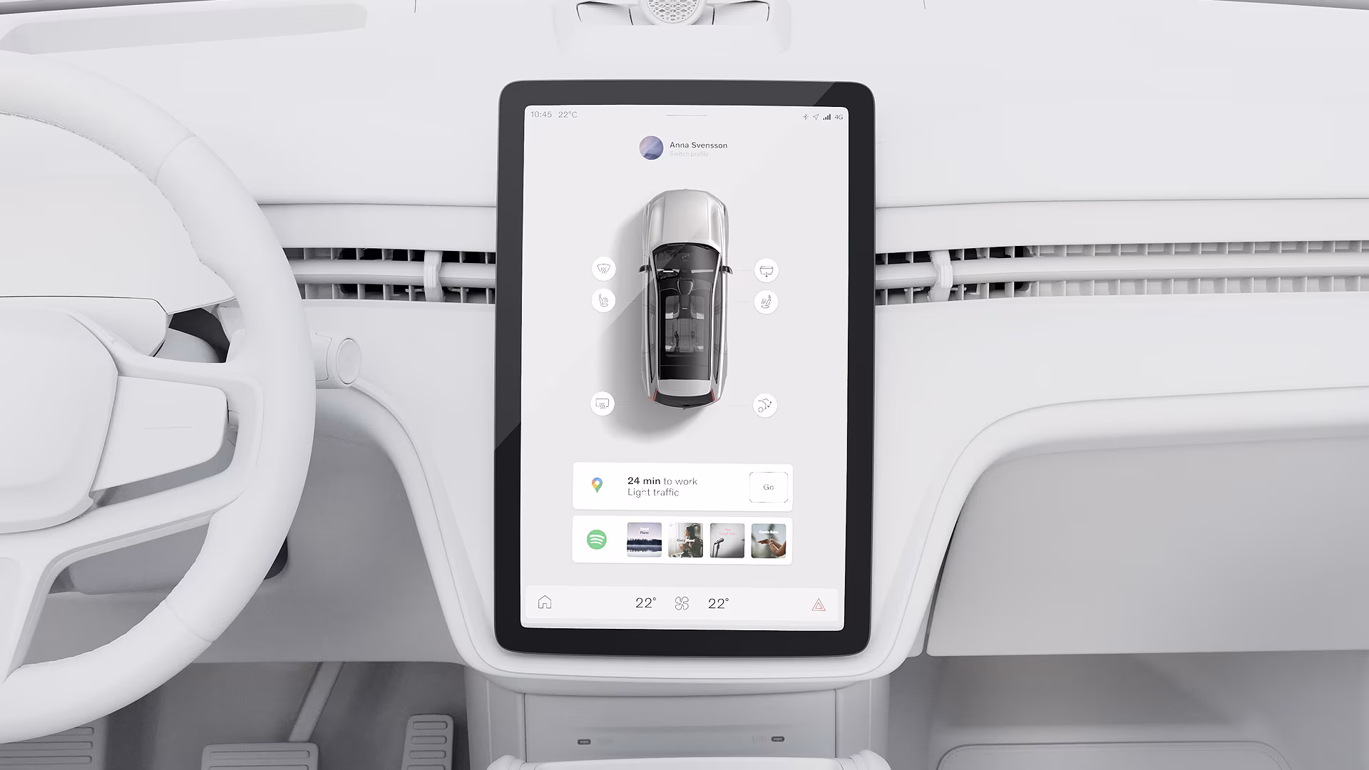 Крупный план центрального сенсорного дисплея автомобиля Volvo, показывающий состояние автомобиля и навигационные функции на минималистичной приборной панели.