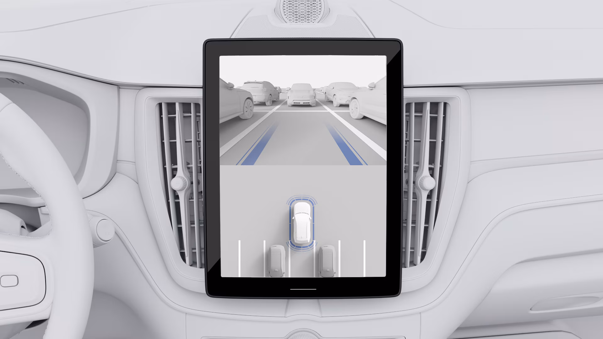 Приборная панель автомобиля Volvo с центральным дисплеем с камерой помощи при парковке и направляющими линиями.