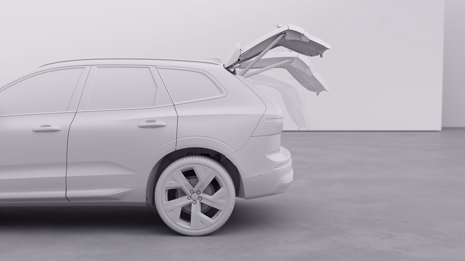 Вид сбоку на внедорожник Volvo с задней дверью багажника, показанной в нескольких положениях, иллюстрирующей движение открывания двери багажника с электроприводом.