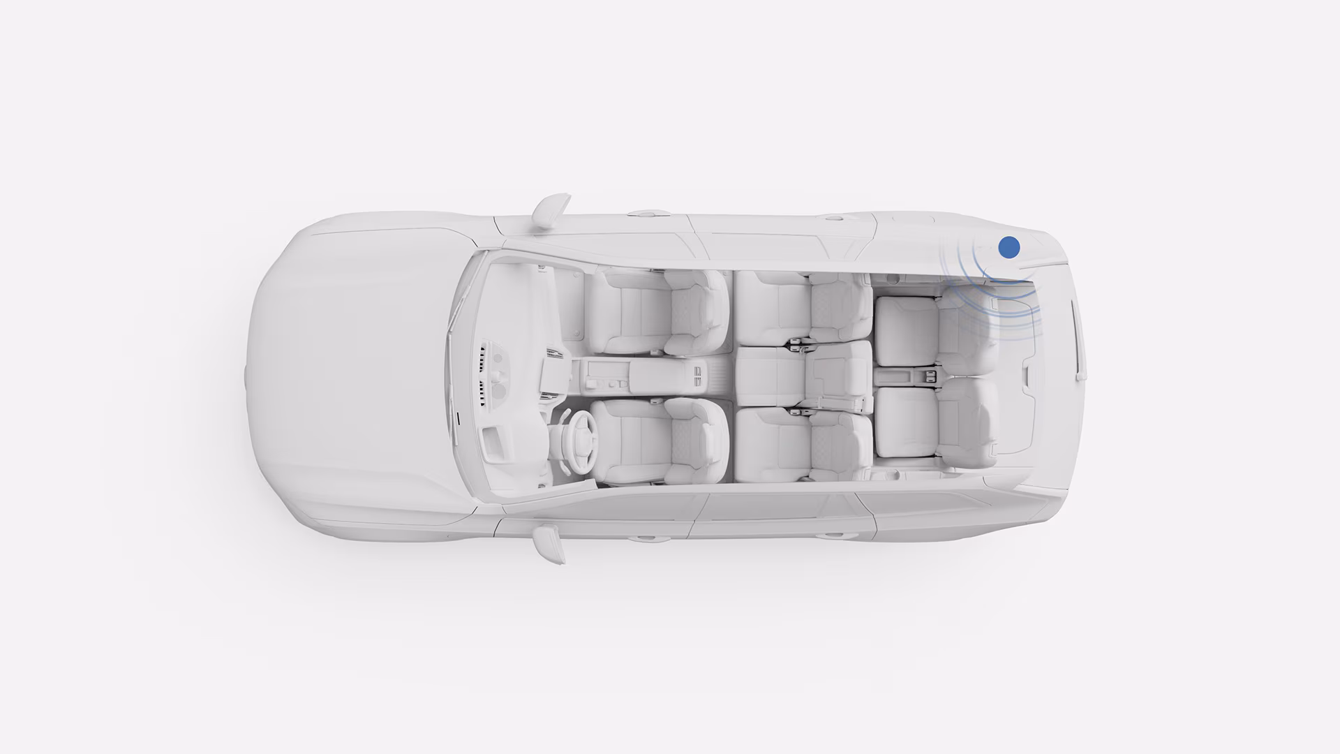 Вид сверху вниз на салон автомобиля Volvo с семью сиденьями и выделенной областью датчика безопасности в задней части.