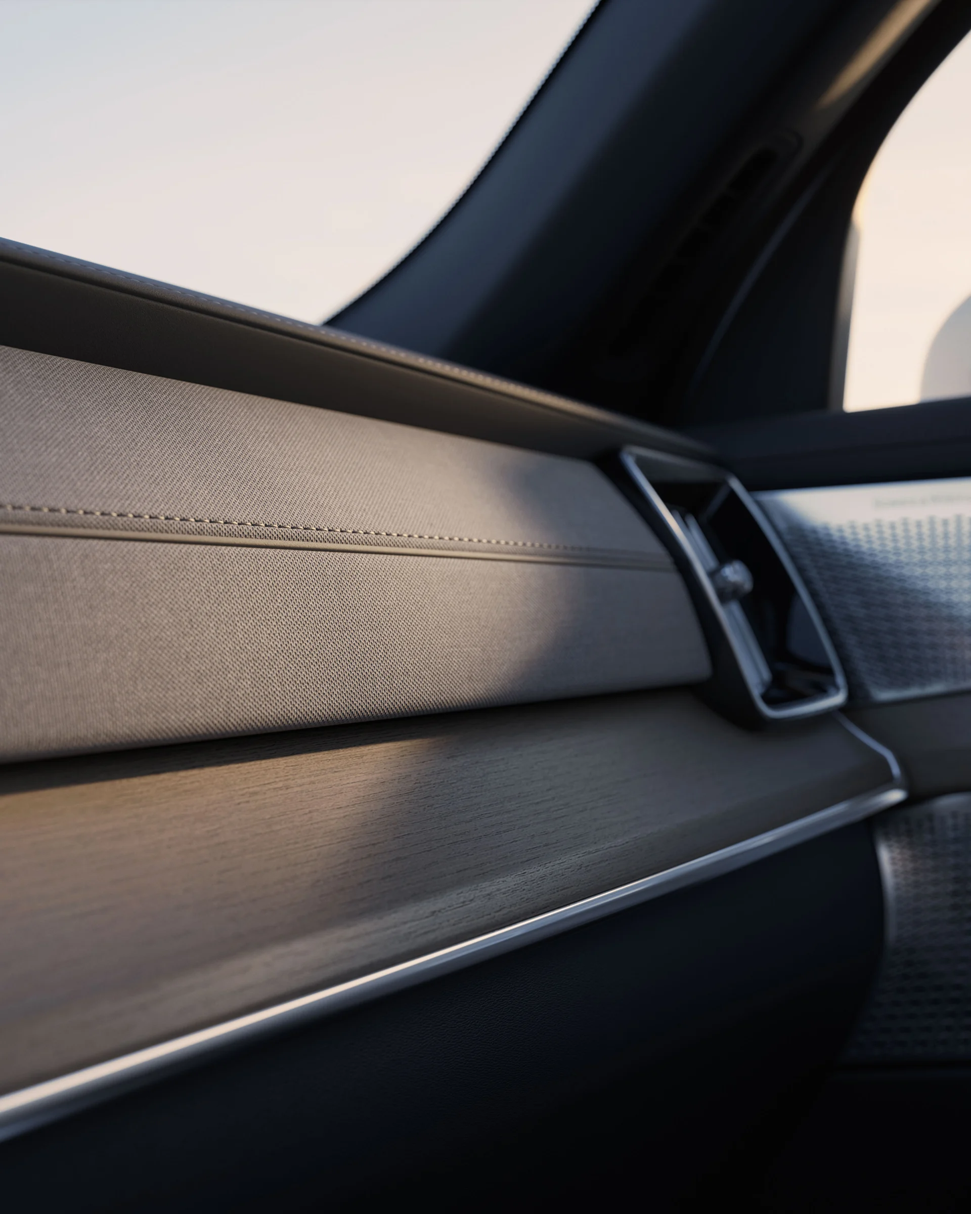 Приборная панель Volvo XC90 крупным планом с минималистичным декором и тонким освещением
